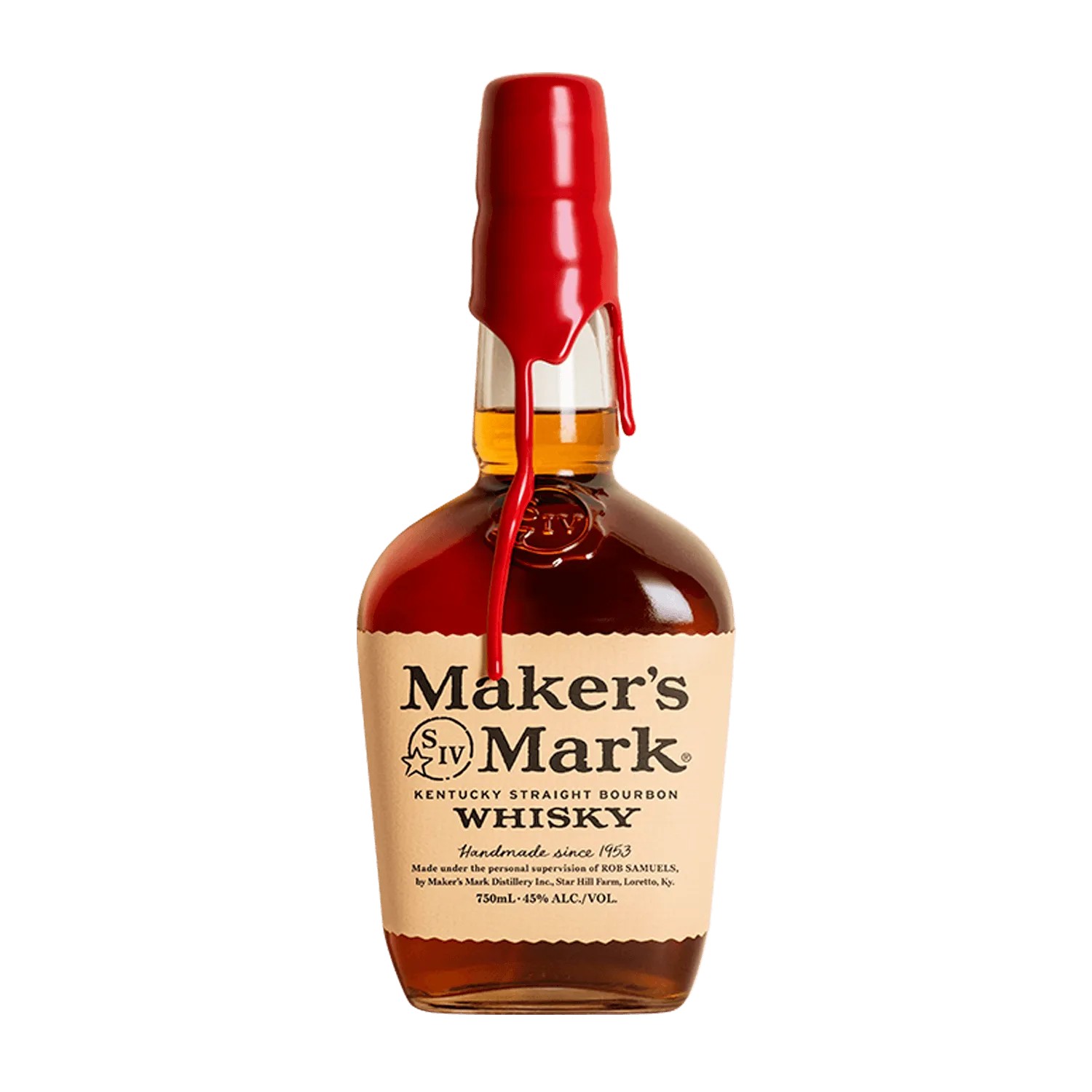 A red wax-dipped bourbon bottle with a twine bow beside wrapping paper